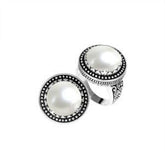 Handcrafted sterling silver Bali ring with Luminous Mother of Pearl cabochon and beaded halo.